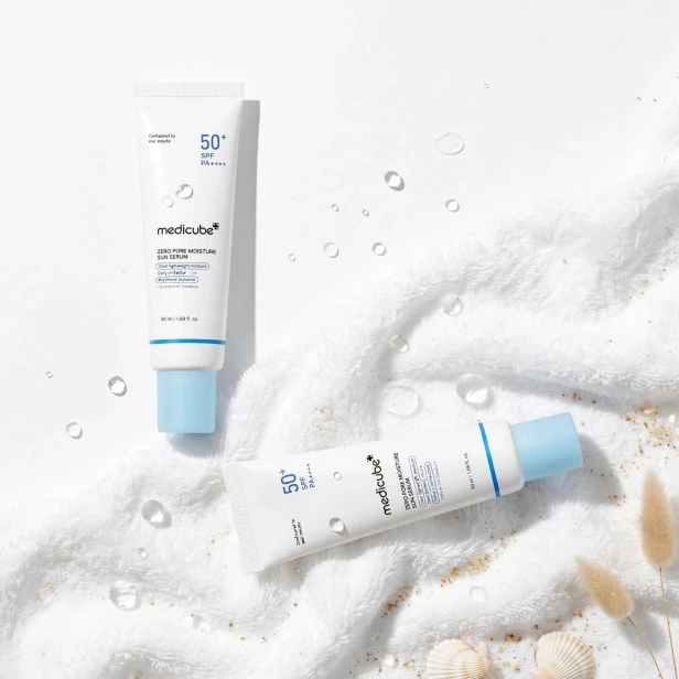 chroniona przed słońcem, nawilżona skóra ze zwężonymi porami po serum Medicube SPF50+