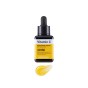 Szklana pipeta i lekka nawilżająco-rozświetlająca konsystencja serum Mediheal Vitamin C Brightening